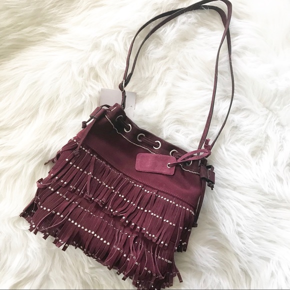 Mossimo Supply Co. Handbags - Mossimo leather suede purple fringe bucket bag NWT